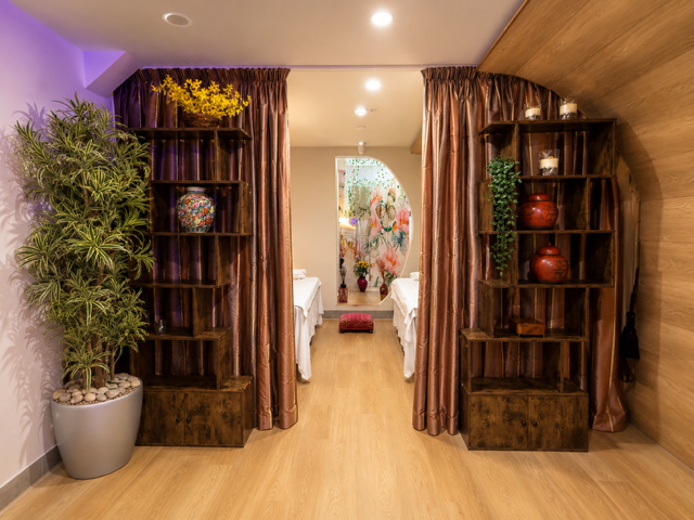 Curtained corridor leading to the couples treatment room